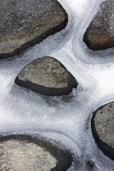 Stones in ice — Stock Photo, Image