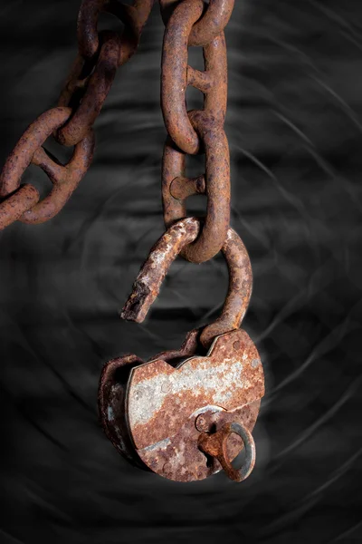 Old padlock hanging on a chain — Stock Photo, Image