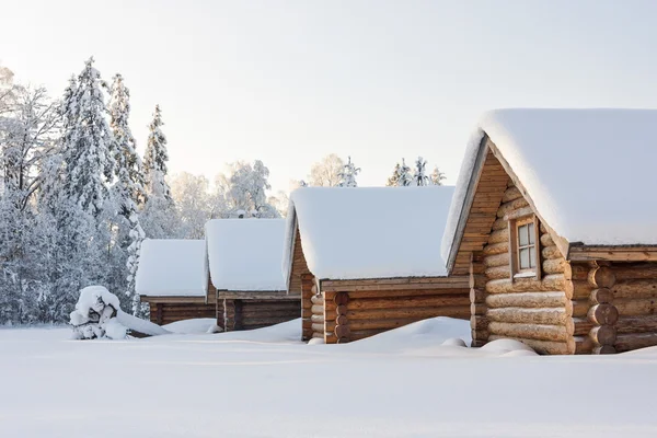 Small camping houses at snowy winter day — Stock Photo, Image