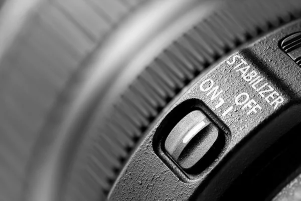 Lens stabilizer button closeup — Stock Photo, Image