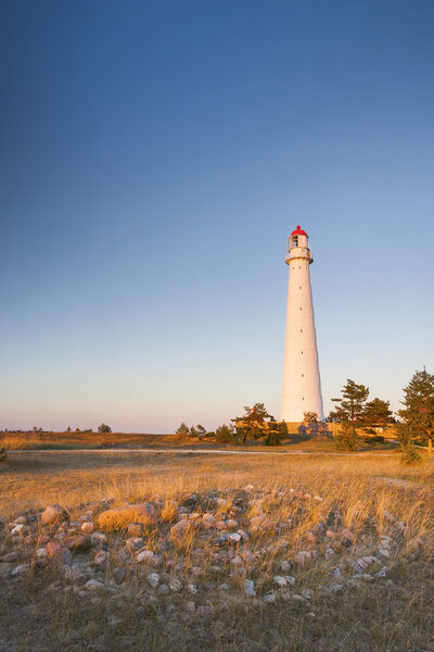 White lighthouse and stone labyrinth