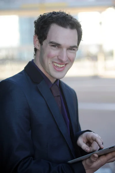 Business man using his ipad — Stock Photo, Image