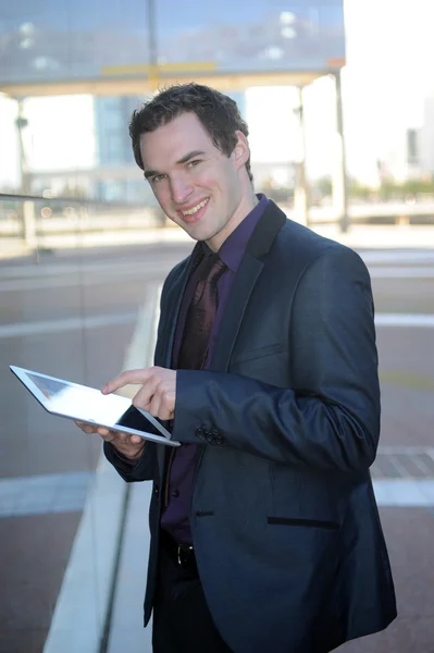 Business man using his ipad — Stock Photo, Image