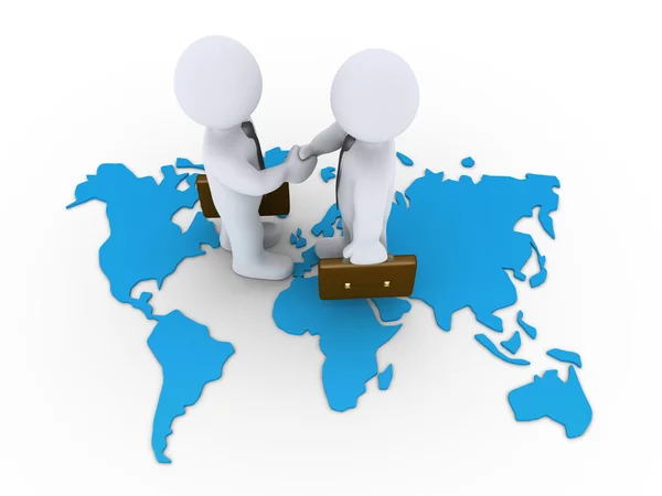 Business agreement on a world map — Stock Photo, Image