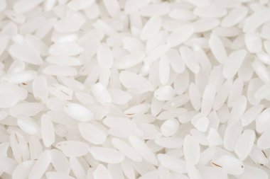 Beyaz uzun pirinç arka plan, pişmemiş işlenmemiş tahıllar, makro bakış.