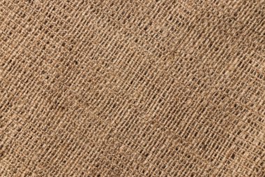 Arka plan olarak doğal keten çuval bezi dokusu.