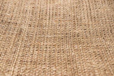 Arka plan olarak doğal keten çuval bezi dokusu.