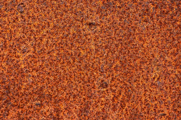 Paslı demir dokusu. Arkaplan ve paslı demirin eski renk ve klasik tarzda dokusu. Paslı, çelik duvarlı arka planda damla var..