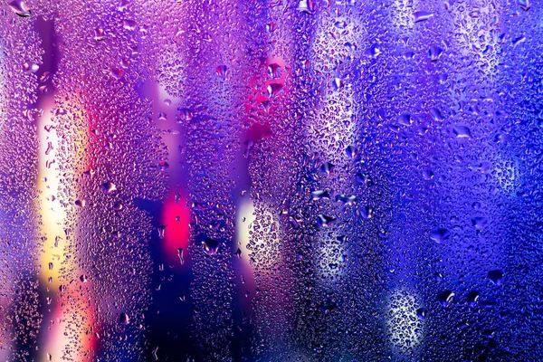 Şeffaf cam pencere üzerinde yoğunlaşma. Su damlaları. Yağmur. Arka plan doku.