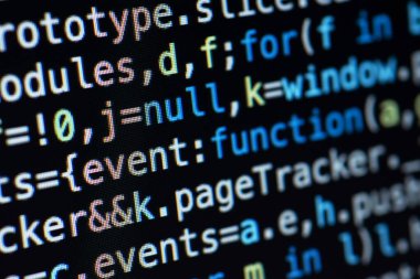 javascript satırları web sitesi uygulaması için bir kütüphaneye kodlanır. İnternet ve web sayfaları için geliştirilmiş bir yazılımda betik dili. Renkli kodlu siyah arkaplan. Javascript komutları