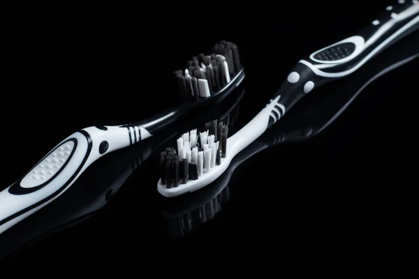 Black White Toothbrushes Isolated Black Background — Stock Photo, Image