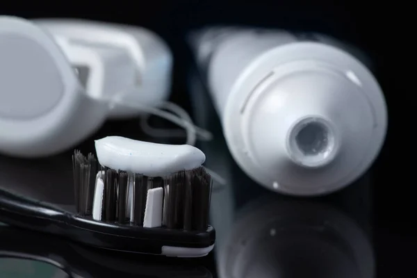 Toothbrush Toothpaste Dental Floss Black Background — Stock Photo, Image