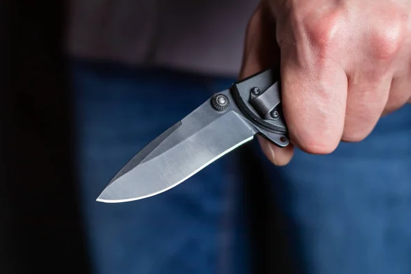 Closeup Male Hand Holds Sharp Knife Black Background — Foto de Stock