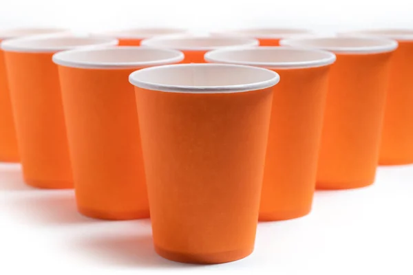 Велика Група Апельсинових Одноразових Паперових Чашок — стокове фото