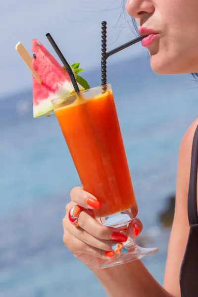 Fresh tropical fruit cocktail with watermelon slice on top — Stock Photo, Image