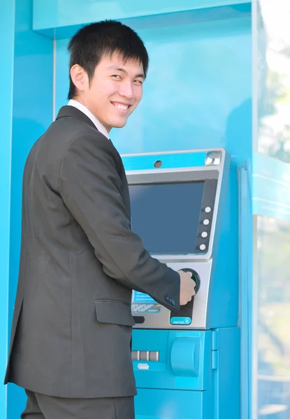 Business man using Automatic Telling Machine — Stock Photo, Image