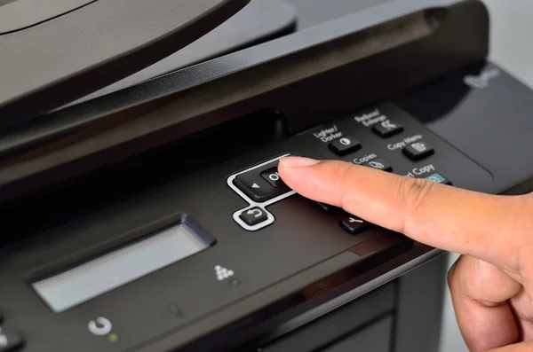 Multifunction printer with finger — Stock Photo, Image