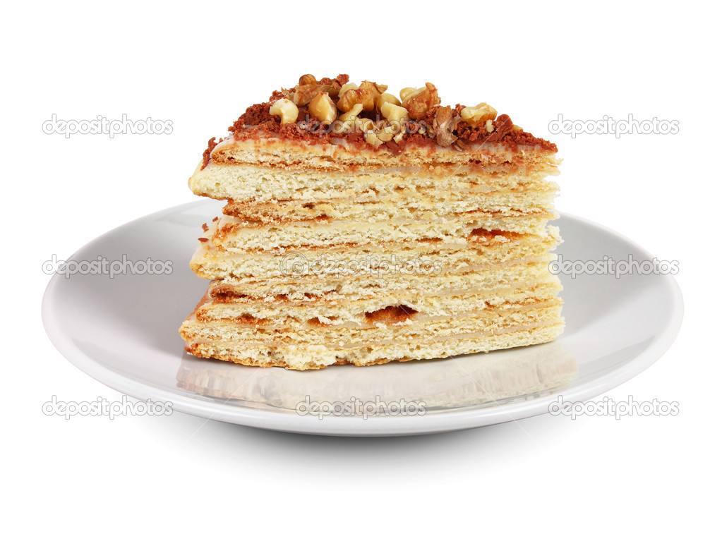 Piece of cake on white plate