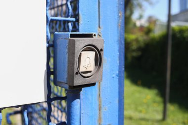 old rubber doorbell on the street