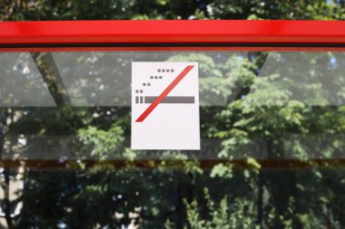 no smoking sign on the background of the stop