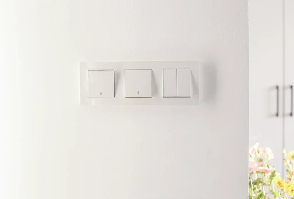 Three Different Light Switches White Wall Background Electrical Wiring Modern — 스톡 사진