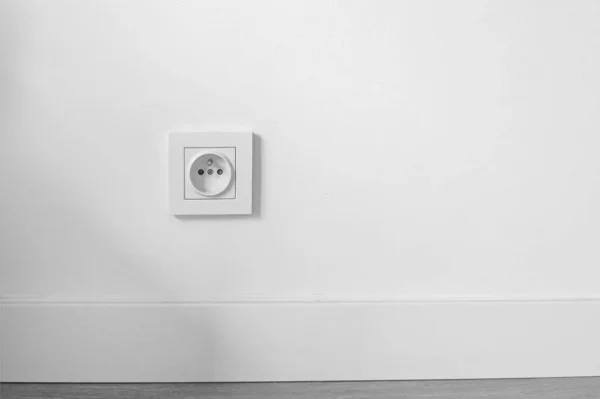 socket on white wall with copyspace, electrical planning, convenient, euro sockets. Power sockets, closeup. Electrical supply