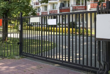 closed gates in front of a government office, closed gate in front of the establishment