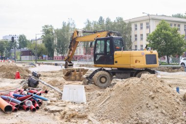 construction of roads, tram tracks with the help of an excavator and other construction equipment