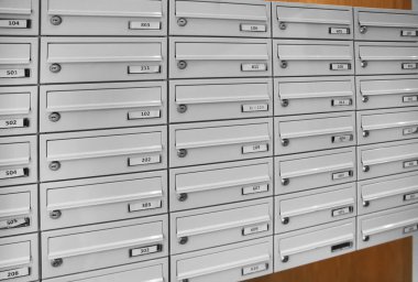 a lot of mailboxes in entrance hall of residental building. High quality photo