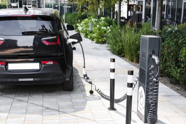 outdoor charging stations for electric vehicles, Electric car is changing on street parking