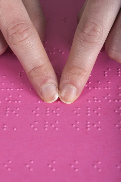 Blind reading pink text — Stock Photo, Image