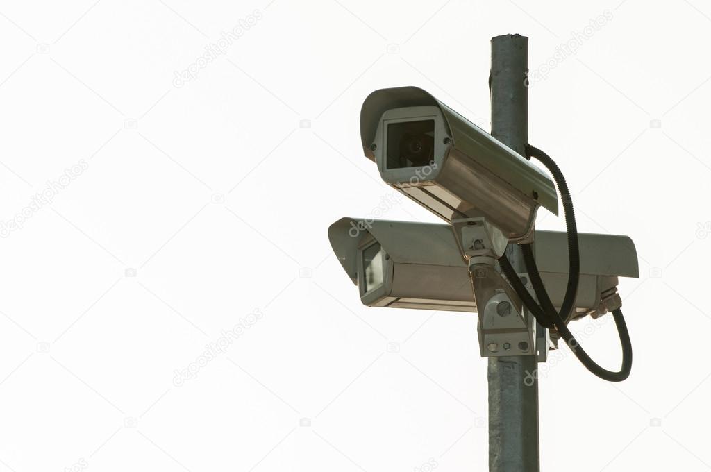 Two security cameras isolated on a white background