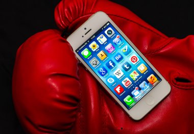 IPhone 5 Apps illuminated screen in a red box glove clipart