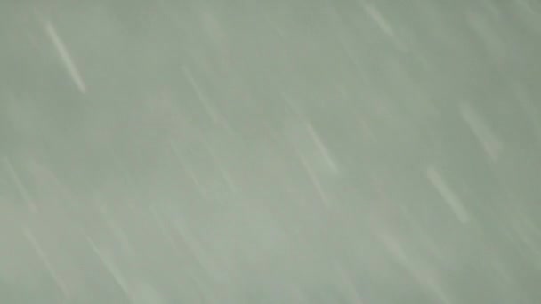 冬の降雪の背景。降水量が多い冬のサイクロン。テキストのコピースペース — ストック動画