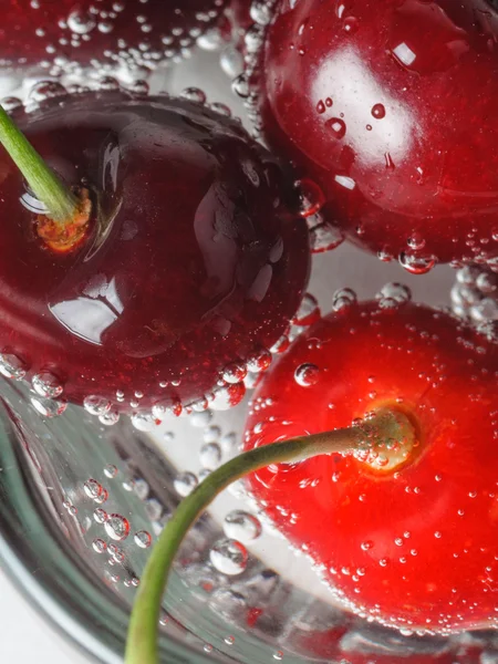 Cherries in water — Stock Photo, Image