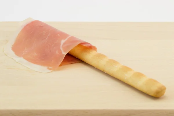 Prosciutto e grissino — Stock fotografie