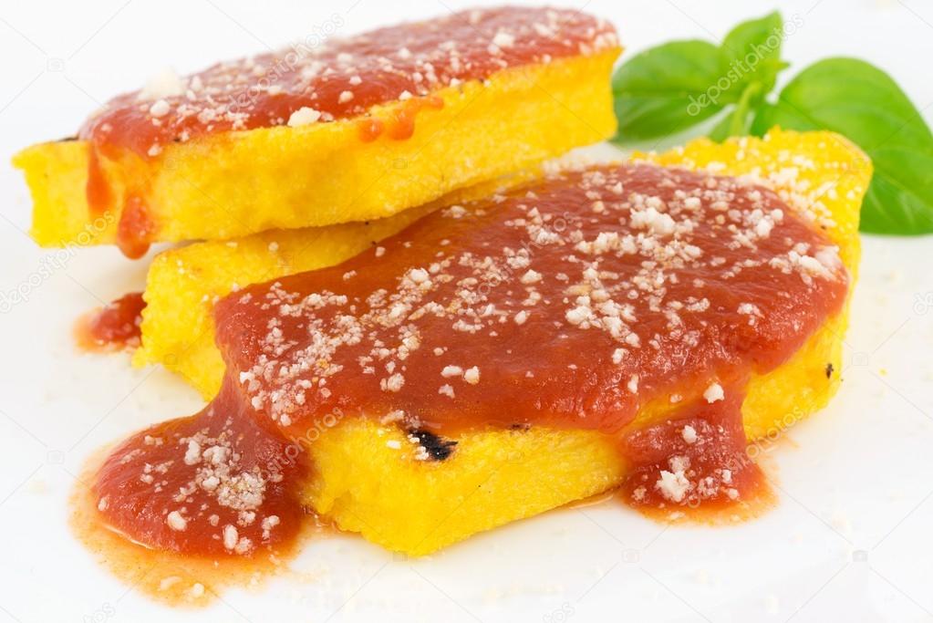 Polenta with tomato sauce and parmesan cheese