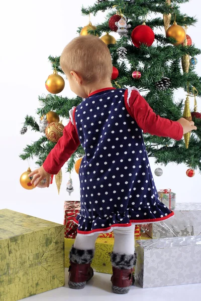 Baby and christmas tree — Stock Photo, Image