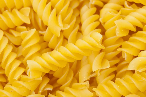 Dry rotini pasta — Stock Photo, Image