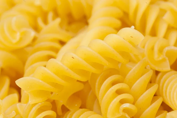 Dry rotini pasta — Stock Photo, Image