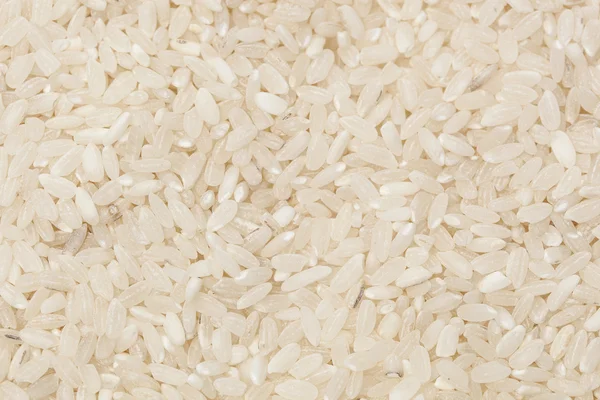 Здоровый сухой коричневый рис — стоковое фото