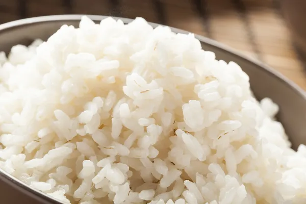 Schüssel mit weißem Bio-Reis — Stockfoto