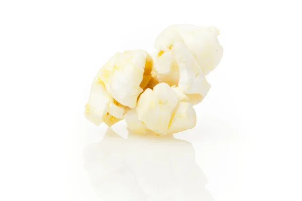 Хрустящий белый попкорн с маслом — стоковое фото
