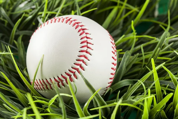 New White Baseball in green grass — Stock Photo, Image