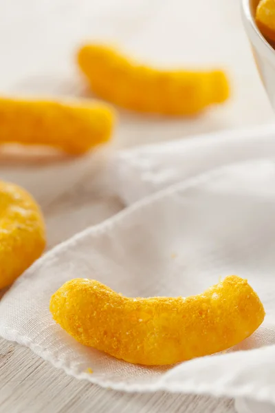 Unhealthy Orange Puffy Cheese Crisps — Stock Photo, Image