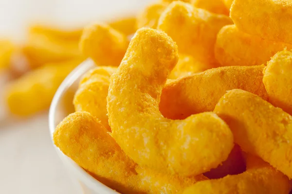 Unhealthy Orange Puffy Cheese Crisps — Stock Photo, Image