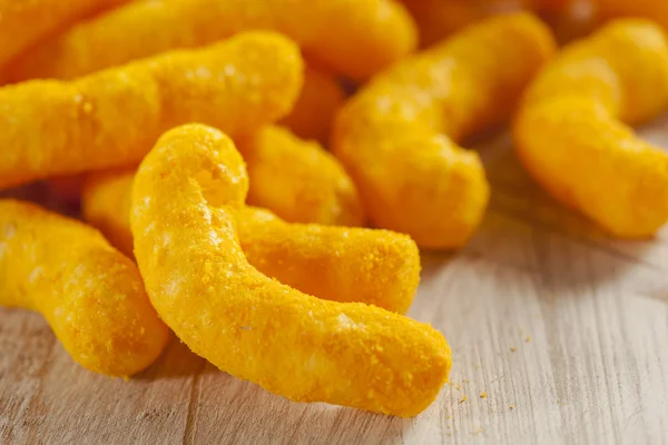 Unhealthy Orange Puffy Cheese Crisps — Stock Photo, Image