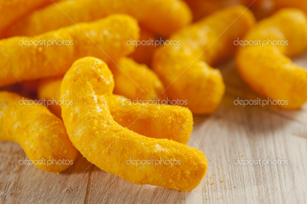 Unhealthy Orange Puffy Cheese Crisps Stock Photo by ©bhofack2 24842503