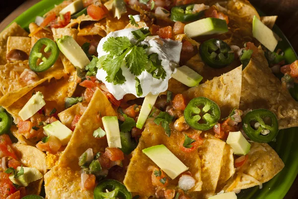 Homemade Unhealthy Nachos with Cheese and Vegetables — Stock Photo, Image