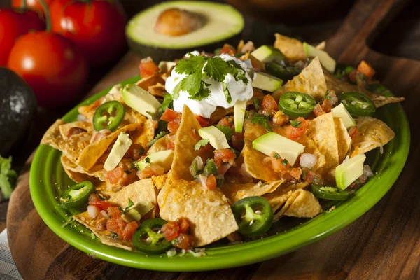 Homemade Unhealthy Nachos with Cheese and Vegetables — Stock Photo, Image